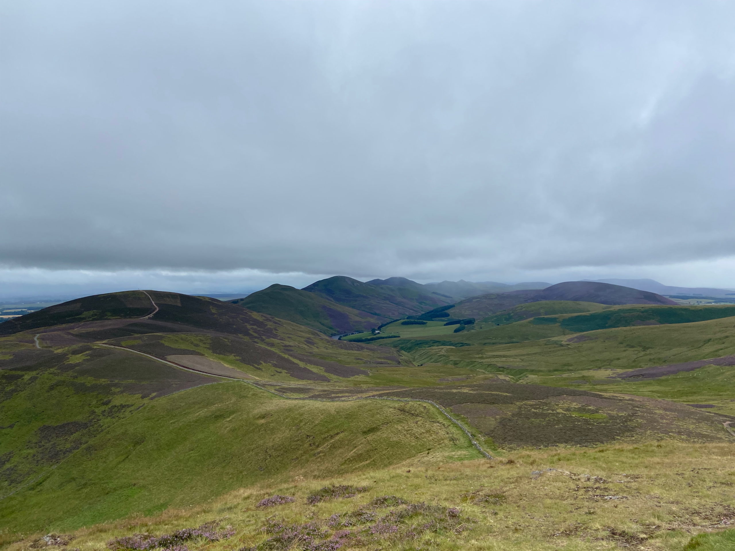 A cloudy sky over the Pentland hills