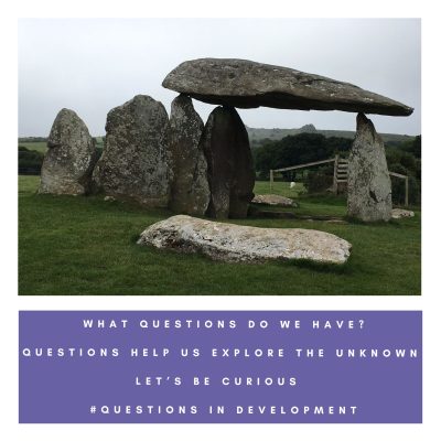 Pentre Ifan burial chamber, South Wales. A heavy stone appears to hover Over figure-like stones In a timeless space That poses many questions